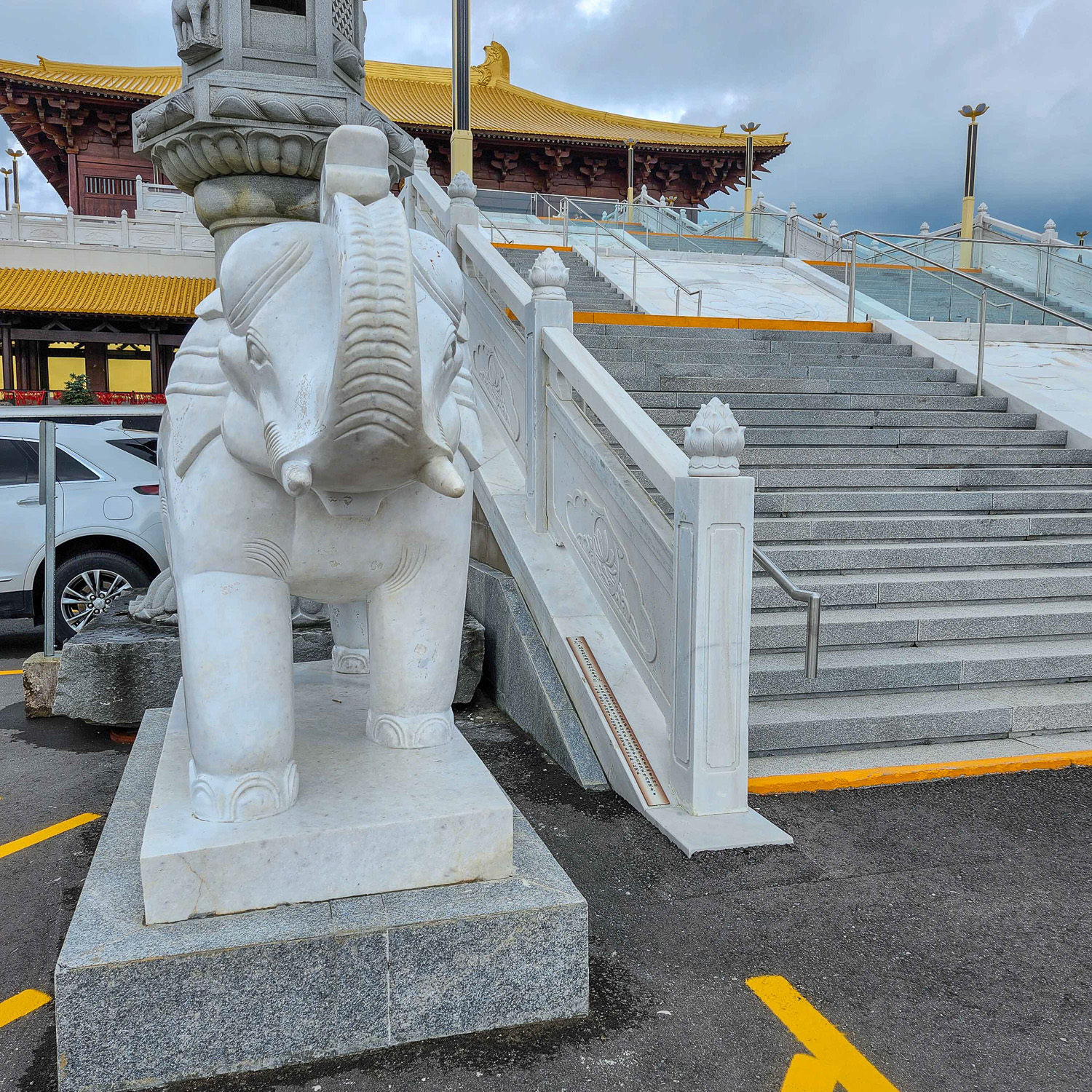 Elephant statue in the parking lot of the temple