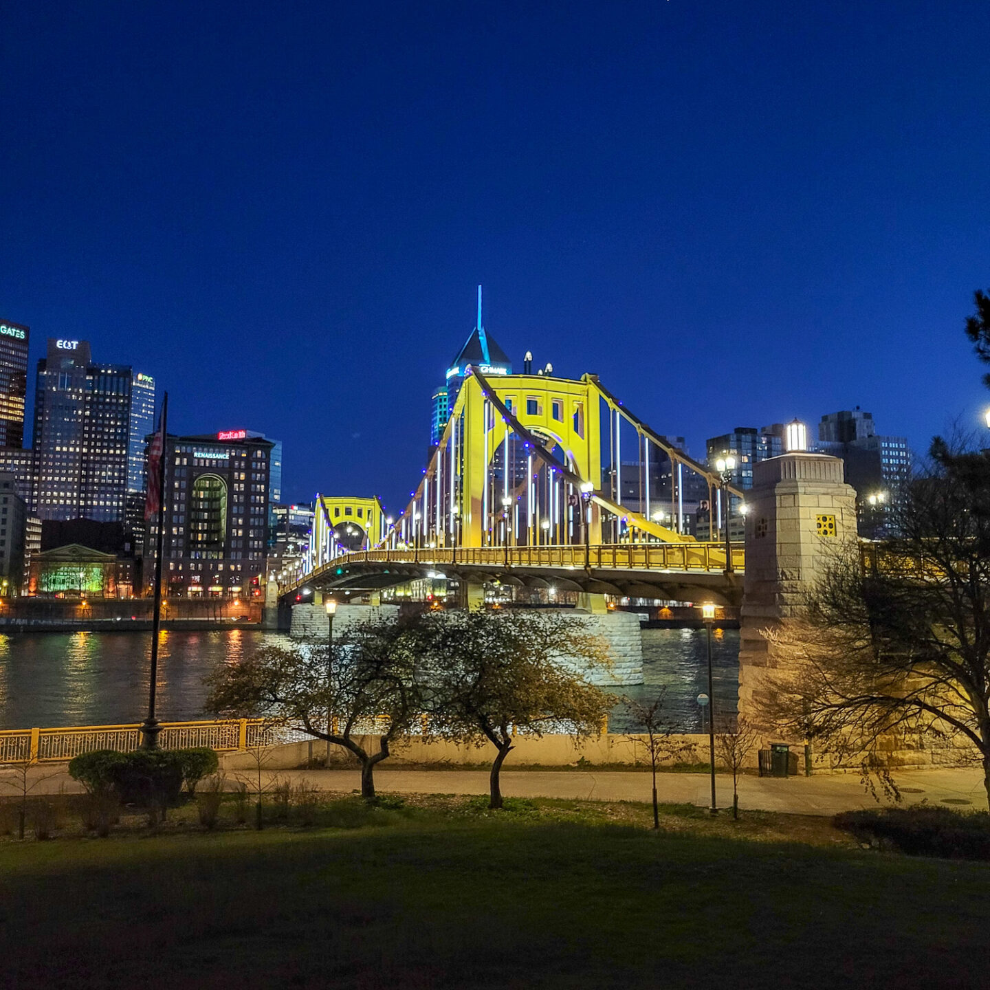 One of the bridges lit up at night at Alleghany Landing which is one of the things to do in Pittsburgh during a weekend trip